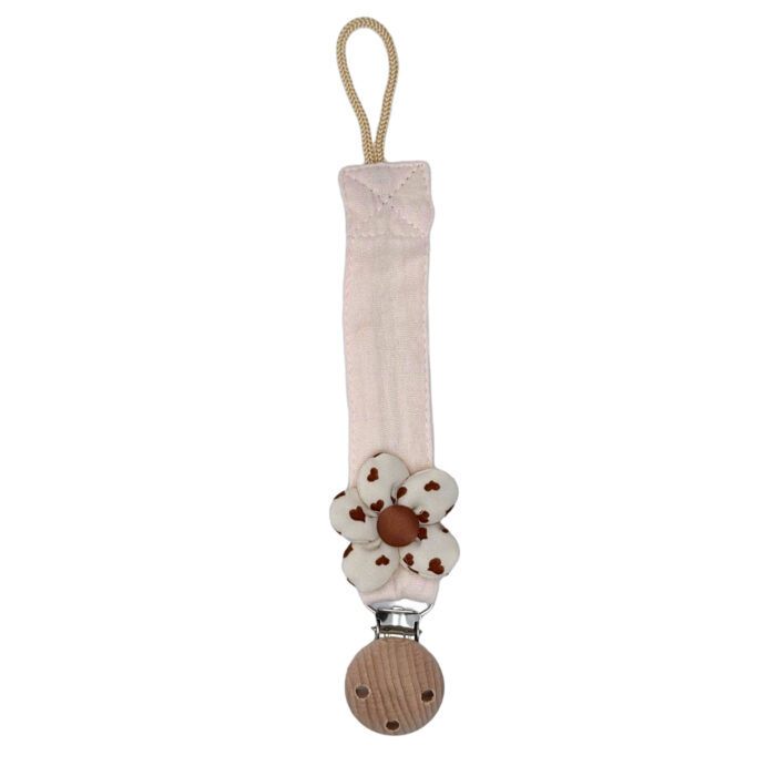 Attache tétine fleur couleur rose